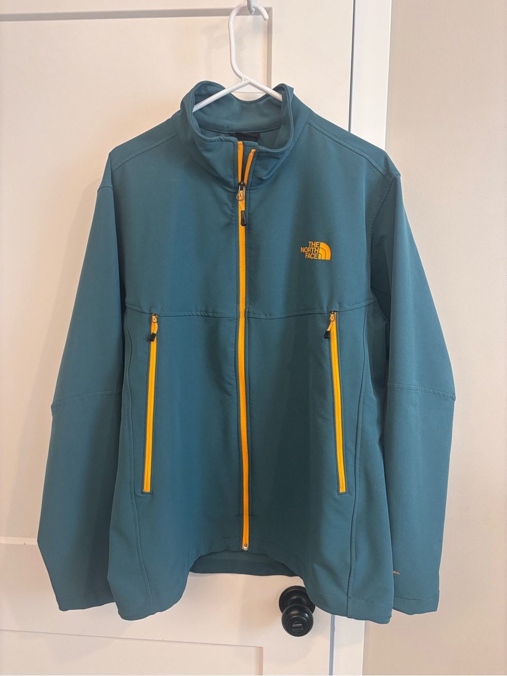 The North Face Teal Softshell Jacket with Yellow Accents